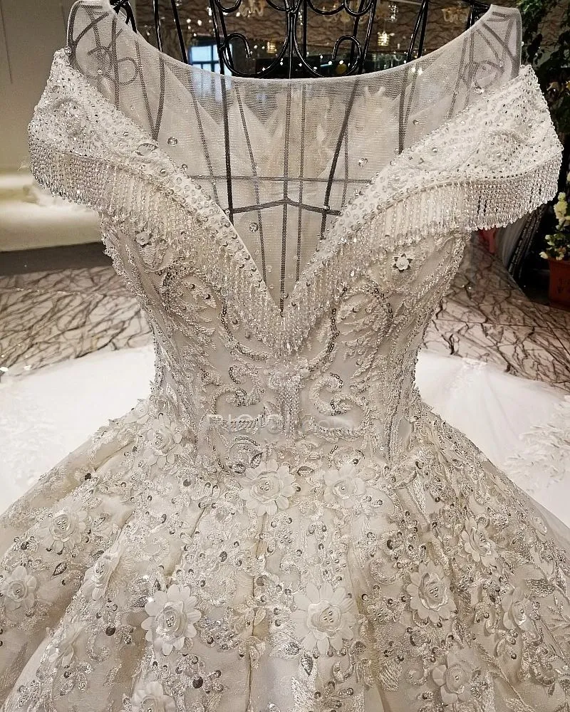 Brillante Glitter Élégant Sans Manches À Frange Dentelle Robe De Mariée Dos Nu Décolleté Boule Luxe