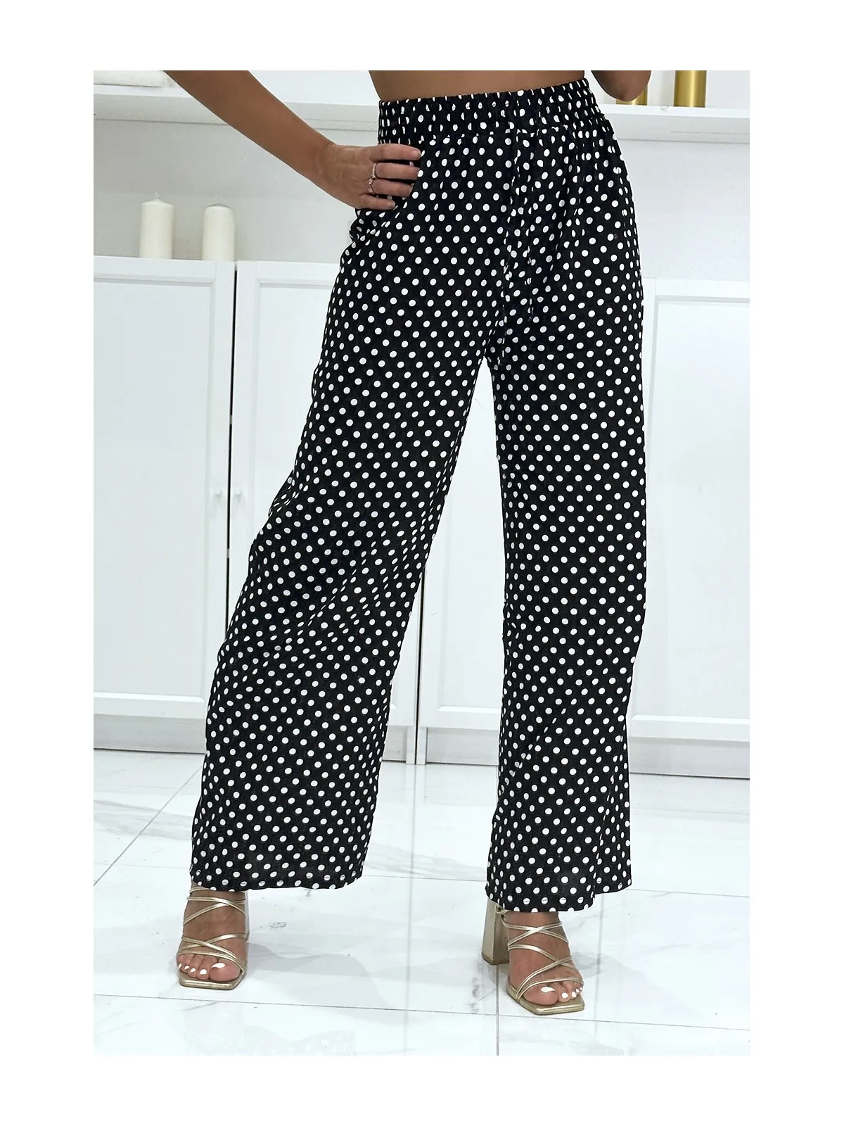 Pantalon palazzo noir en coton avec petit pois