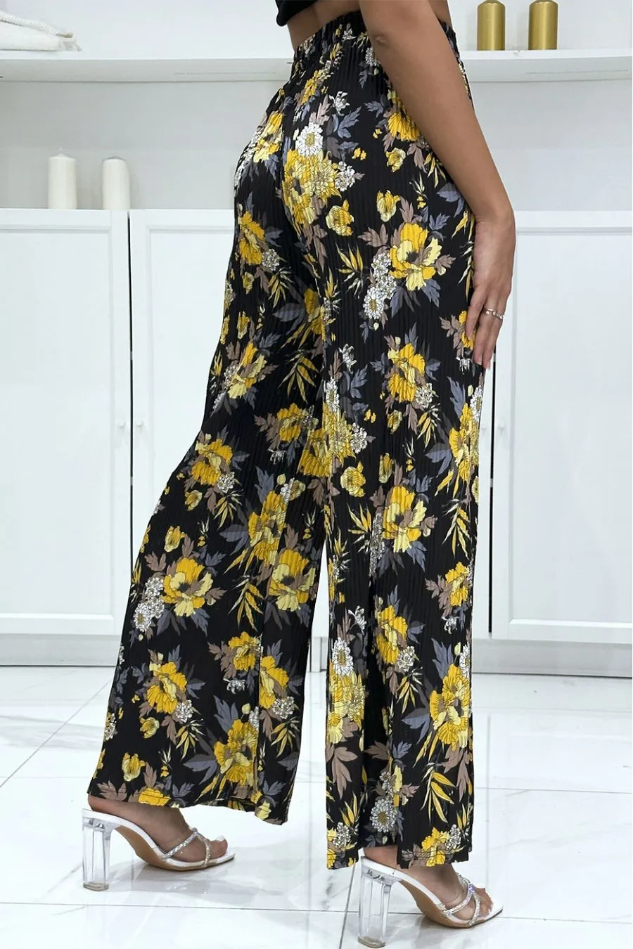 Pantalon palazzo plissé noir à motif fleuris