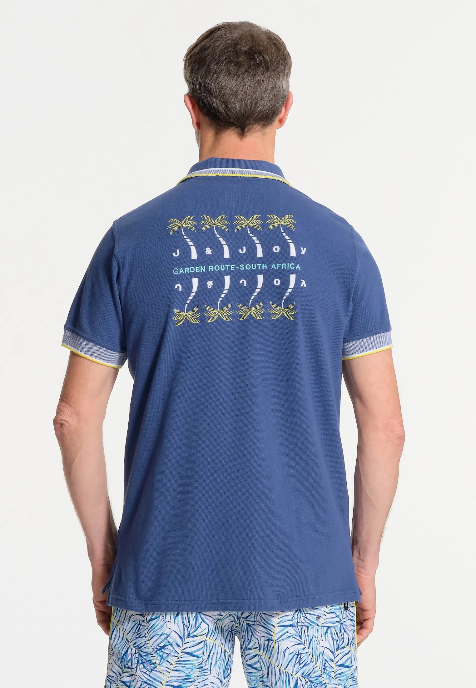 Polo homme bleu avec finitions contrastées